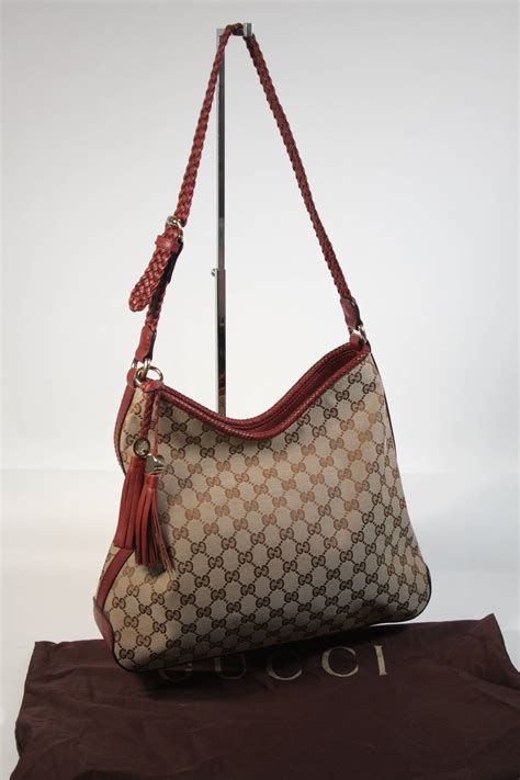 gucci hobo with tassels gold hooks|Gucci hobo canvas.